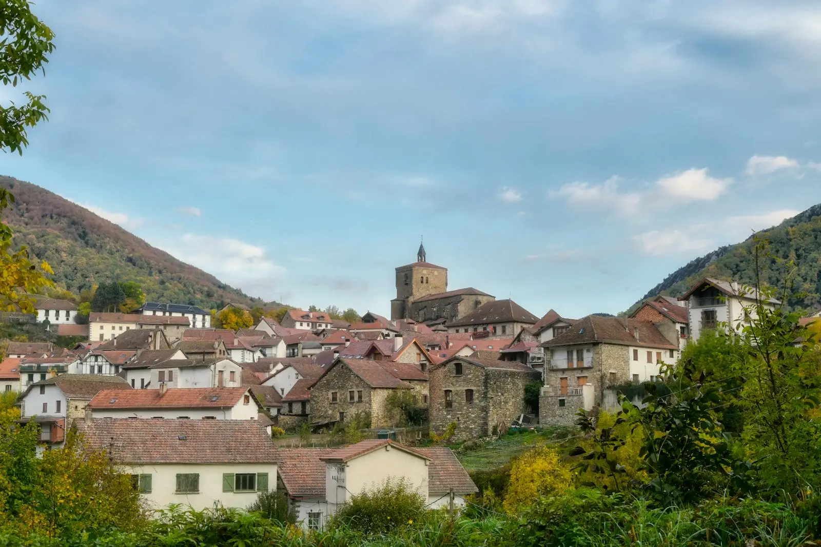 Picturesque town of Isaba in Navarre with historical architecture and lush mountains.